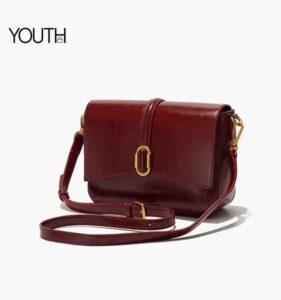 This is a angle view photo for a burgundy crossbody bag style#yt0072