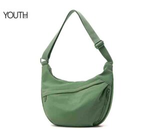 This is a microside photo for a green nylon crossbody bags style#yt0076