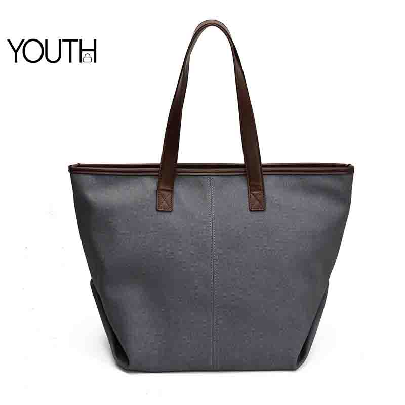 This is a positive photo for a dark gray canvas tote bag style#yt0099
