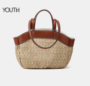 This is a positive photo for a brown shoulder bags straw bag style# yt0114