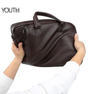 This is a twisting view photo for a brown crossbody portfolio bag style# yt0126