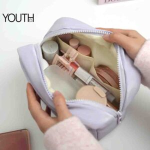 This is a open view showing photo for a purple waterproof travel cosmetic bags style#yt0182