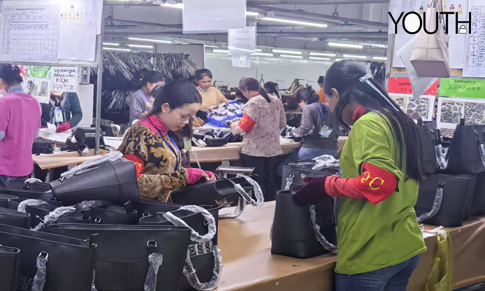 This is a photo of wokers in QC in cambodia factory
