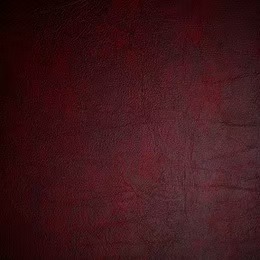 Red genuine leather material with texture