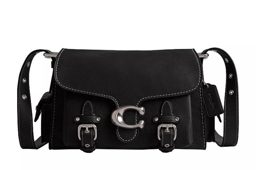 A front view of a black coach western tabby messenger bags