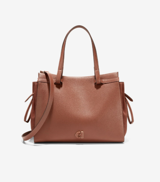 This is a front view of a brown cole tote bag 1