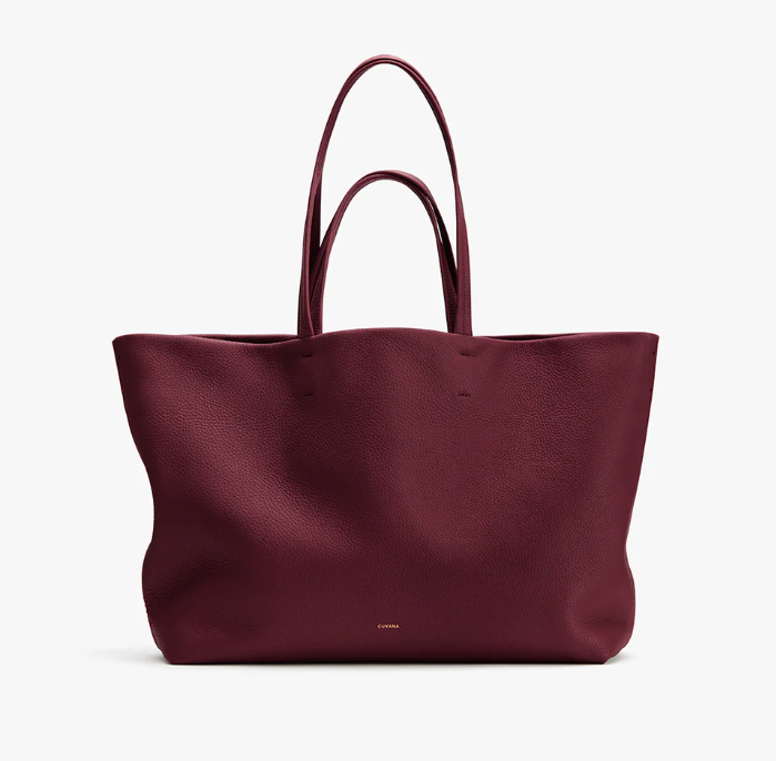 This is a front view photo of a Burgundy cuyana leather tote 2