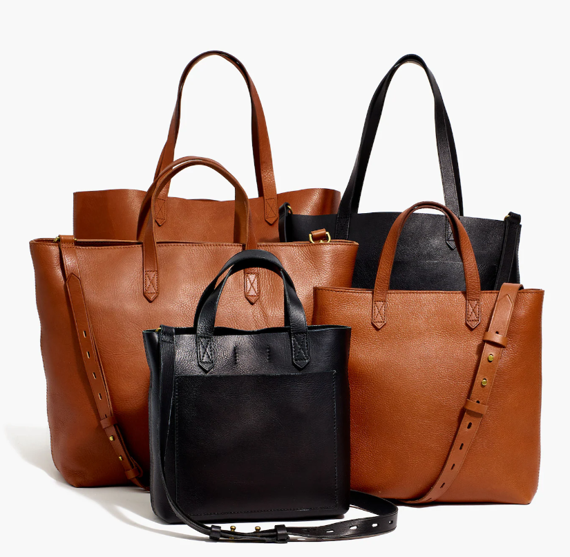 A front view of 5 madewell the medium transport tote bag,one black smaller size ,4 medium size